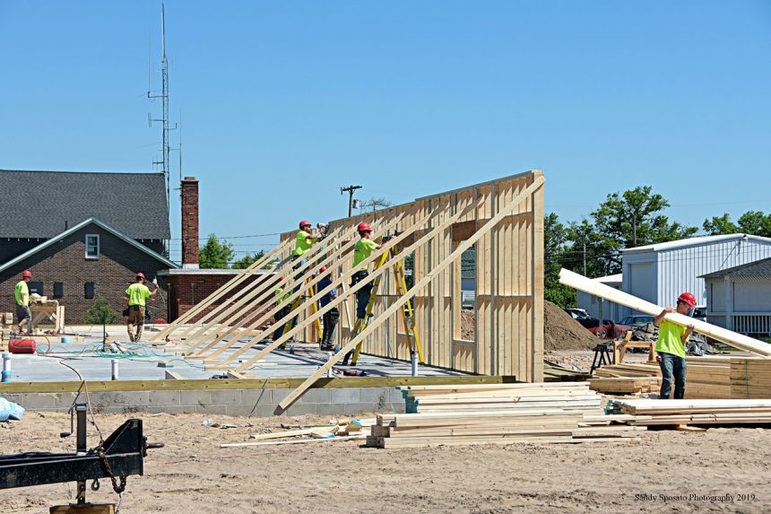 Carpenters Framing the East Wall